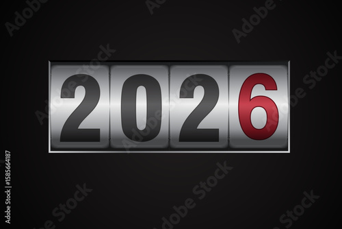 New year mechanical counter showing 2025 switching to 2026 on black background