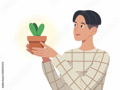 Young Man Holding Plant in a Pot