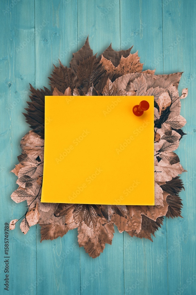 Fototapeta premium Autumn leaves with yellow note