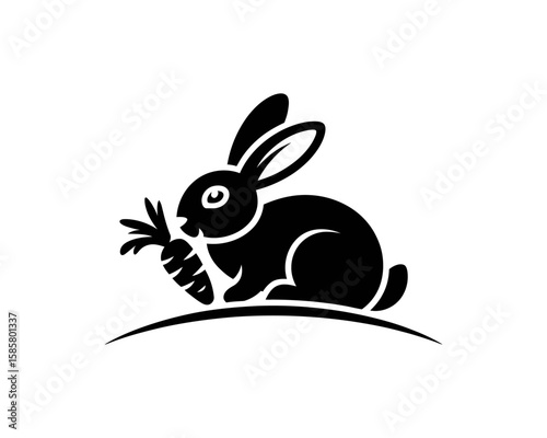 A minimalist black silhouette of a rabbit holding a carrot captures the essence of playfulness and simplicity, making it ideal for animal-themed designs and vegetarian concepts.