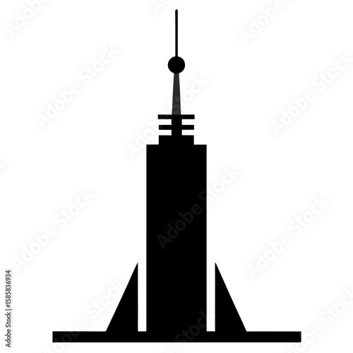 Black silhouette of a tall skyscraper with an antenna mast isolated on white background