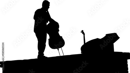 Silhouette of musician with cello and piano on stage ready for a concert performance at night time