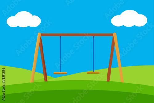 empty swing set in a grassy field under blue sky