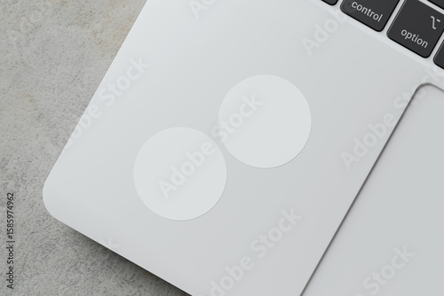 glued sticker for mockup. round stickers set collection. realistic paper on laptop background. blank space for creative design.3d high resolution rendering.