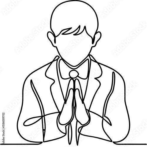 Child actor bowing in suit with hands clasped in prayer position  