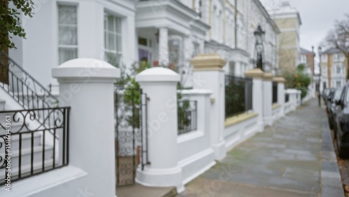 Photography Blurred view of elegant chelsea street in london during autumn captures bokeh effect with defocused architecture, embodying the essence of a picturesque uk neighborhood