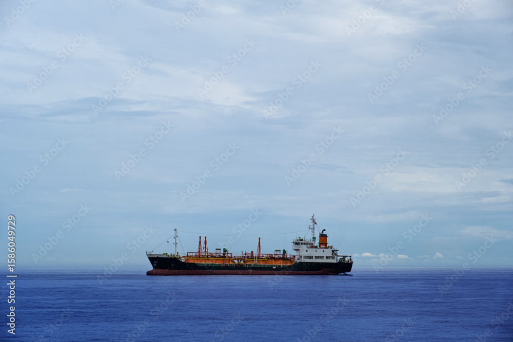 Naklejka premium LNG Tanker ship (Liquefied Natural Gas)contrail in the ocean sea ship carrying container and running for export from container international port ocean, oil and gas with petrochemical thanker shipping