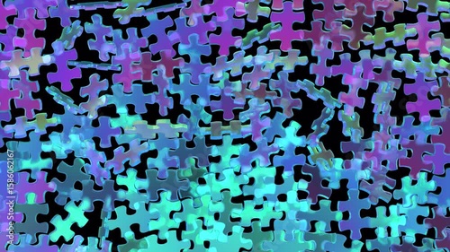 Video footage of animated 3D jigsaw puzzle pieces floating and moving in space with vibrant green, blue, and purple gradient colors.
