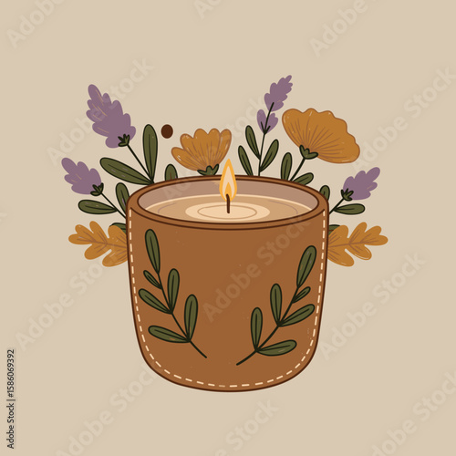Aromatic candle with flower decorations and warm glow on beige background  