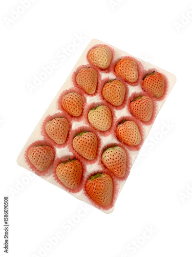 Delicious strawberries packed neatly on a tray, to be sold in supermarket. Top view.