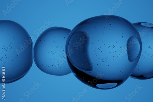Close-up of transparent water droplets floating in air against blue background, isolated macro view, abstract liquid texture for freshness, purity, hydration or clean concept visuals