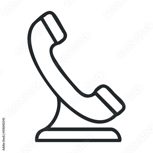 Classic telephone handset icon with base in black and white line art. Outline vector illustration