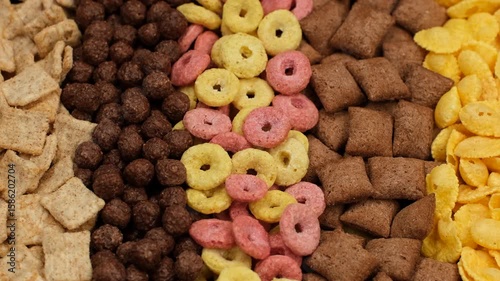 Different types of breakfast cereals top view, slider shot