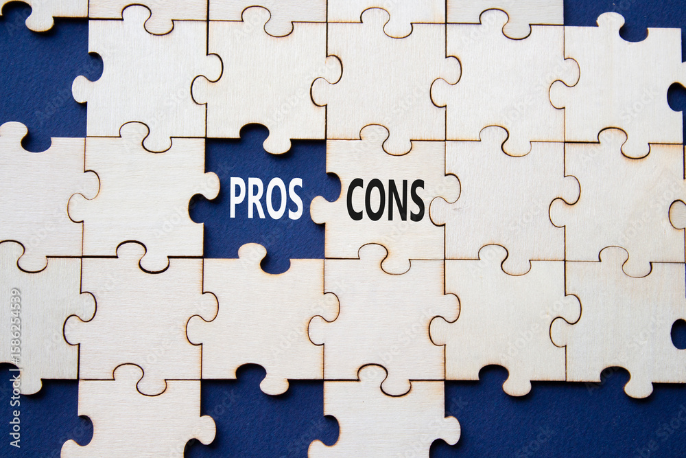 Pros vs Cons symbol. Concept word Pros vs Cons on wooden puzzle. Beautiful deep blue background. Business and Pros vs Cons concept. Copy space Pros vs Cons symbol. Concept word Pros vs Cons on wooden puzzle. Beautiful deep blue background. Business and Pros vs Cons concept. Copy space