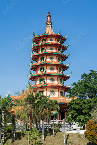 Colorful vertical view of landmark Avalokitesvara or Guanyin pagoda at Vihara Buddhagaya Watugong, Semarang, Central Java, Indonesia
