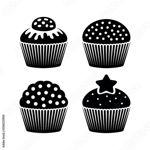 Four decorative cupcakes with dotted frosting muffin