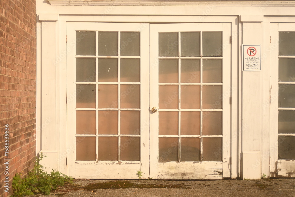 Obraz premium Glass doors framed with faded white paint