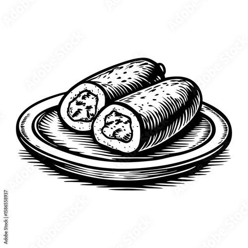 Two fried croquetas on a plate served as appetizer or tapas. Delicious fried croquetas offer rich flavor and smooth texture.