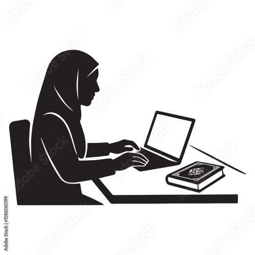 Muslim woman wearing a hijab typing on a laptop with a book on the desk