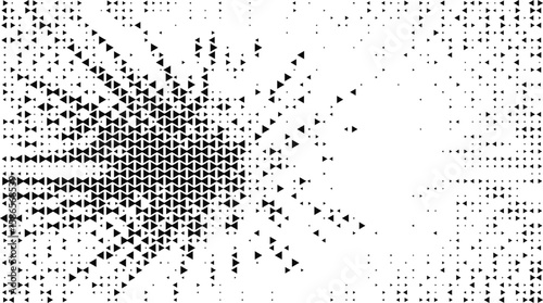 Abstract black triangles pattern exploding outwards on a white background