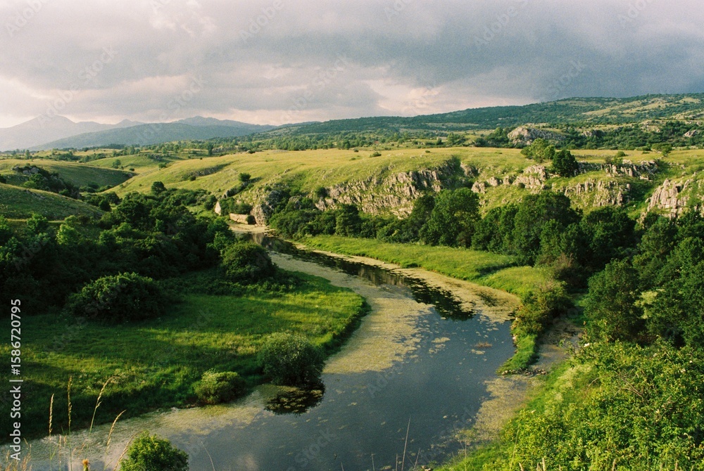 Naklejka premium Landscape with river in the mountains