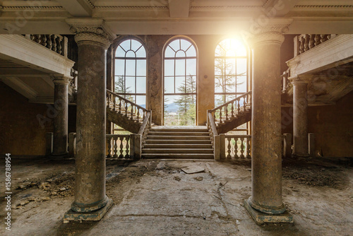 Large entrance hall with columns in old abandoned mansion, Sanatorium Imereti, Tskaltubo