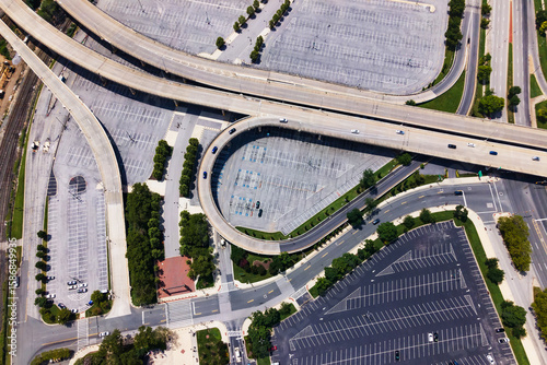 Modern transportation infrastructure and empty parking lots. Top-down view.