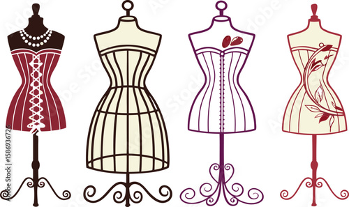 Four stylized corsets on display stands mannequin fashion
