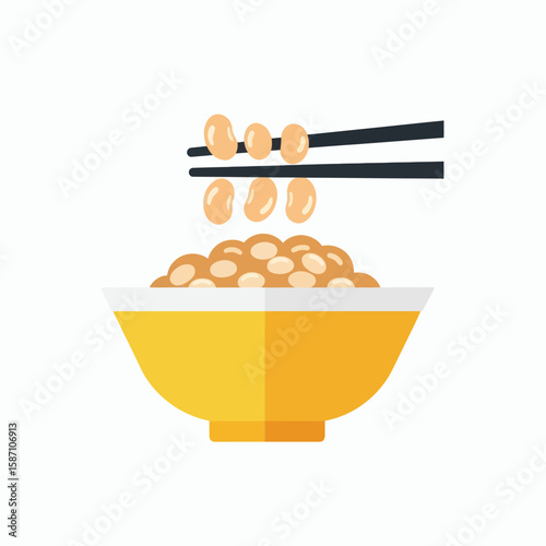 A yellow bowl filled with natto with chopsticks lifting some of the fermented soybeans