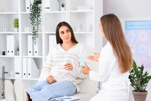 Young woman visiting gyneco...