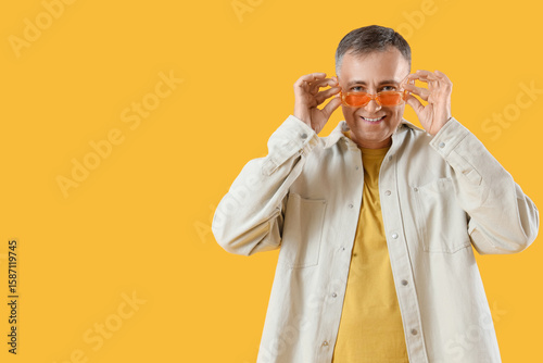 Mature man in sunglasses on...