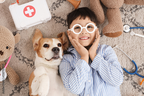 Cute little doctor with Bea...