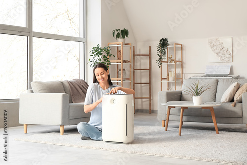 Modern humidifier and young...