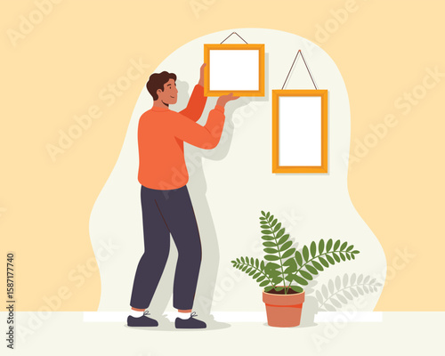 Young man carefully selecting picture frames for home decor flat vector illustration