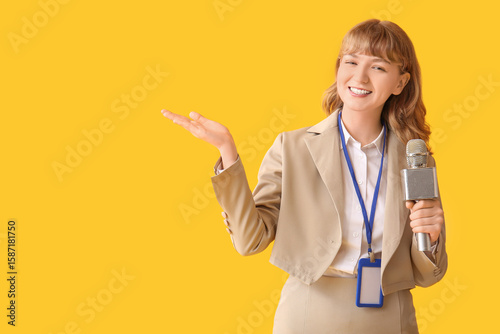 Young happy female reporter...