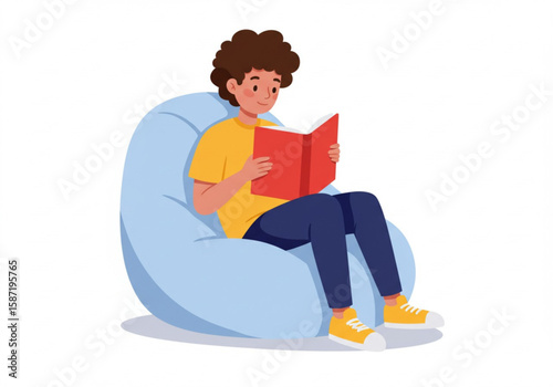 Young person with curly hair reading a book while sitting comfortably in a beanbag chair