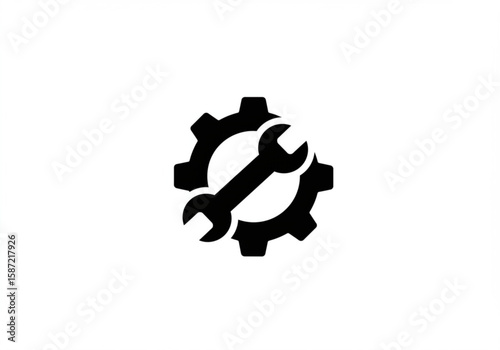 Black silhouette of a wrench and gear symbolizing mechanics and repair services