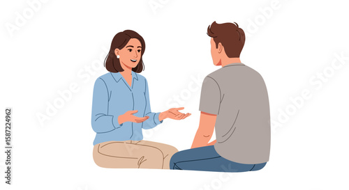 Two people sitting engaged in conversation casual attire lighthearted discussion.