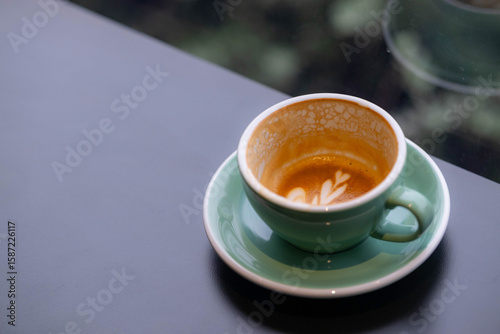 empty cup of coffee with heart latte art