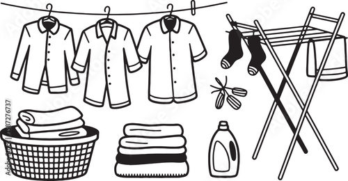 Clothes drying on a line and rack with laundry basket and detergent shirts socks