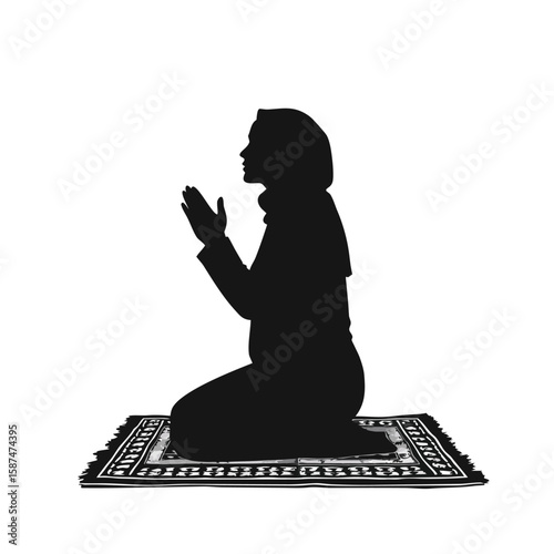Woman praying on prayer mat silhouette kneeling