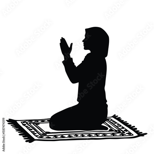Woman praying on rug silhouette kneeling