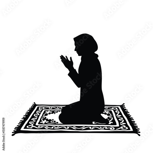Person praying on rug silhouette kneeling
