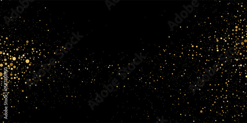 Gold glitter texture on a black background. Holiday background. Golden explosion of confetti. Golden grainy abstract texture on a black background. Design element