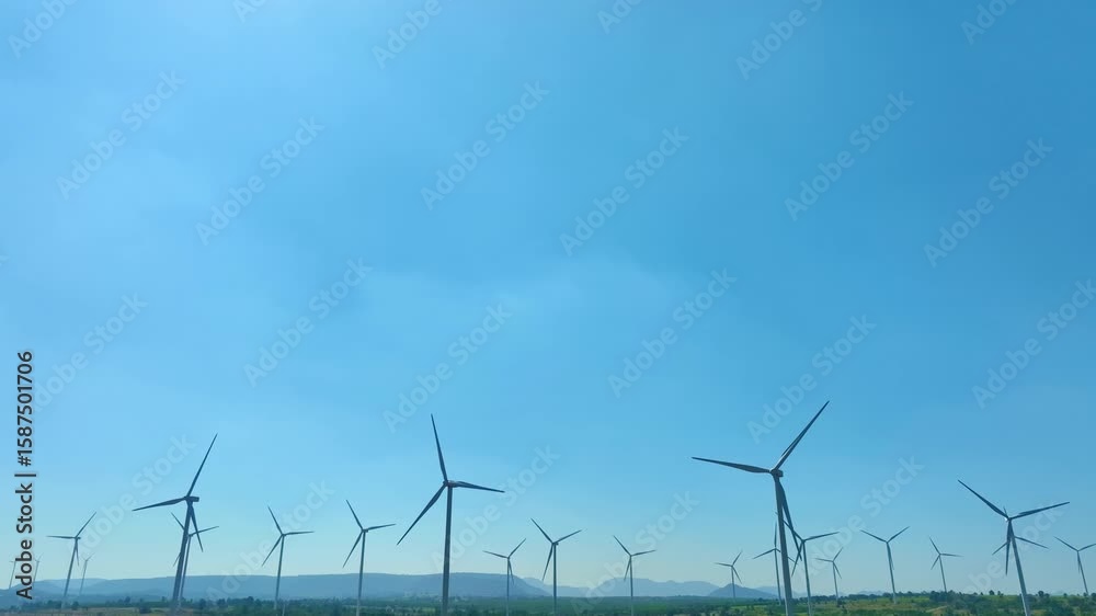Wind farm on the mountain on blue sky day wind energy concept alternative energy Renewable energy