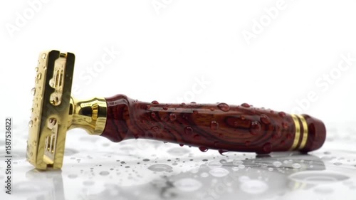 Gold and red razor on white background