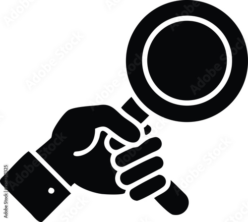 Hand holding magnifying glass icon