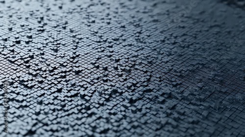 A closeup of a grid of raised and lowered dark grey squares