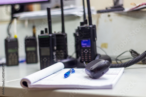 Two-Way Radios and Communication Gear on a Desk