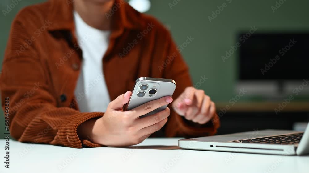 Businessman hand working digital marketing media in virtual screen with mobile phone and modern compute
